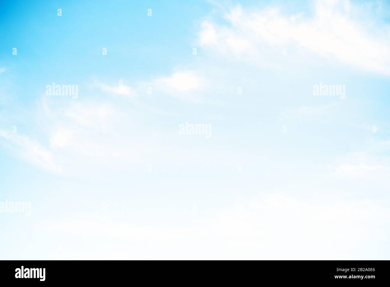 Clear blue sky and white clouds summer background Stock Photo - Alamy