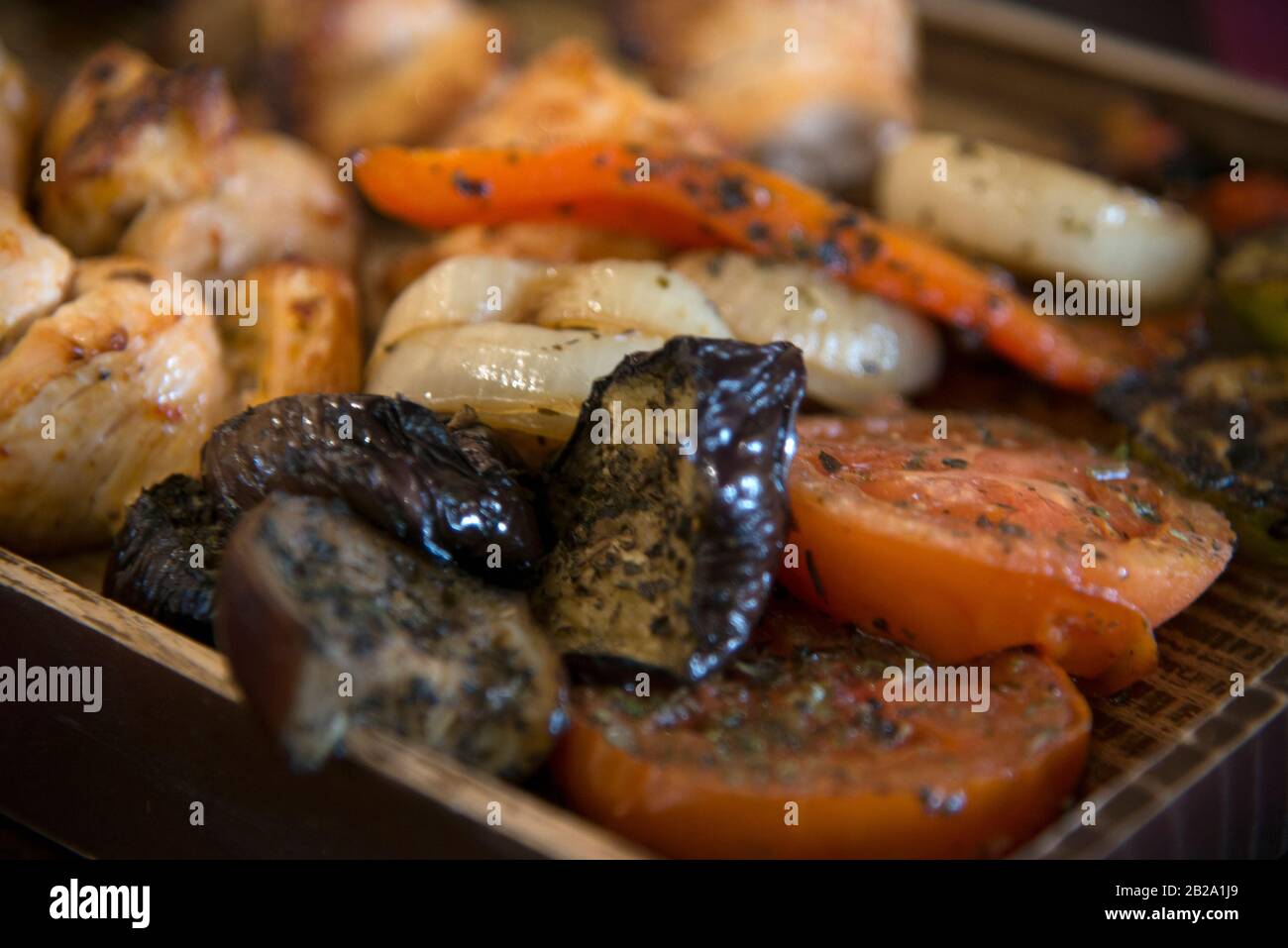 Grilled tomato, paprika, onion, eggplant and other... powdered with