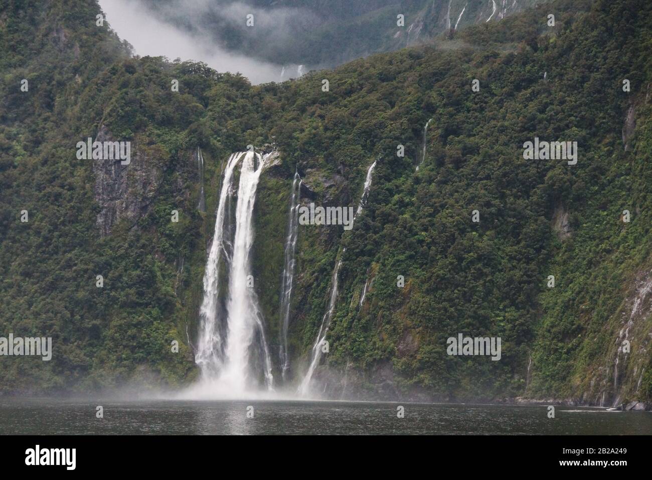 Waterfall at Milford Sound Stock Photo