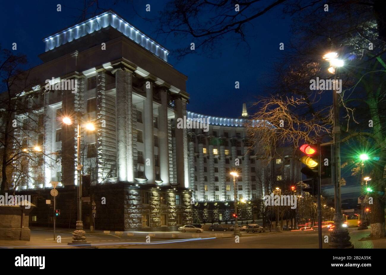 Illuminated council of ministers - Kiev, Ukraine. Dark blue sky in background. Stock Photo