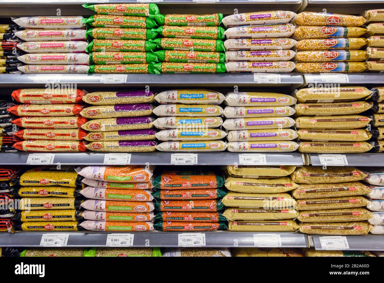 Packets of rice, lentils, sweetcorn and other pulses for sale at a supermarket, Istanbul, Turkey. Stock Photo
