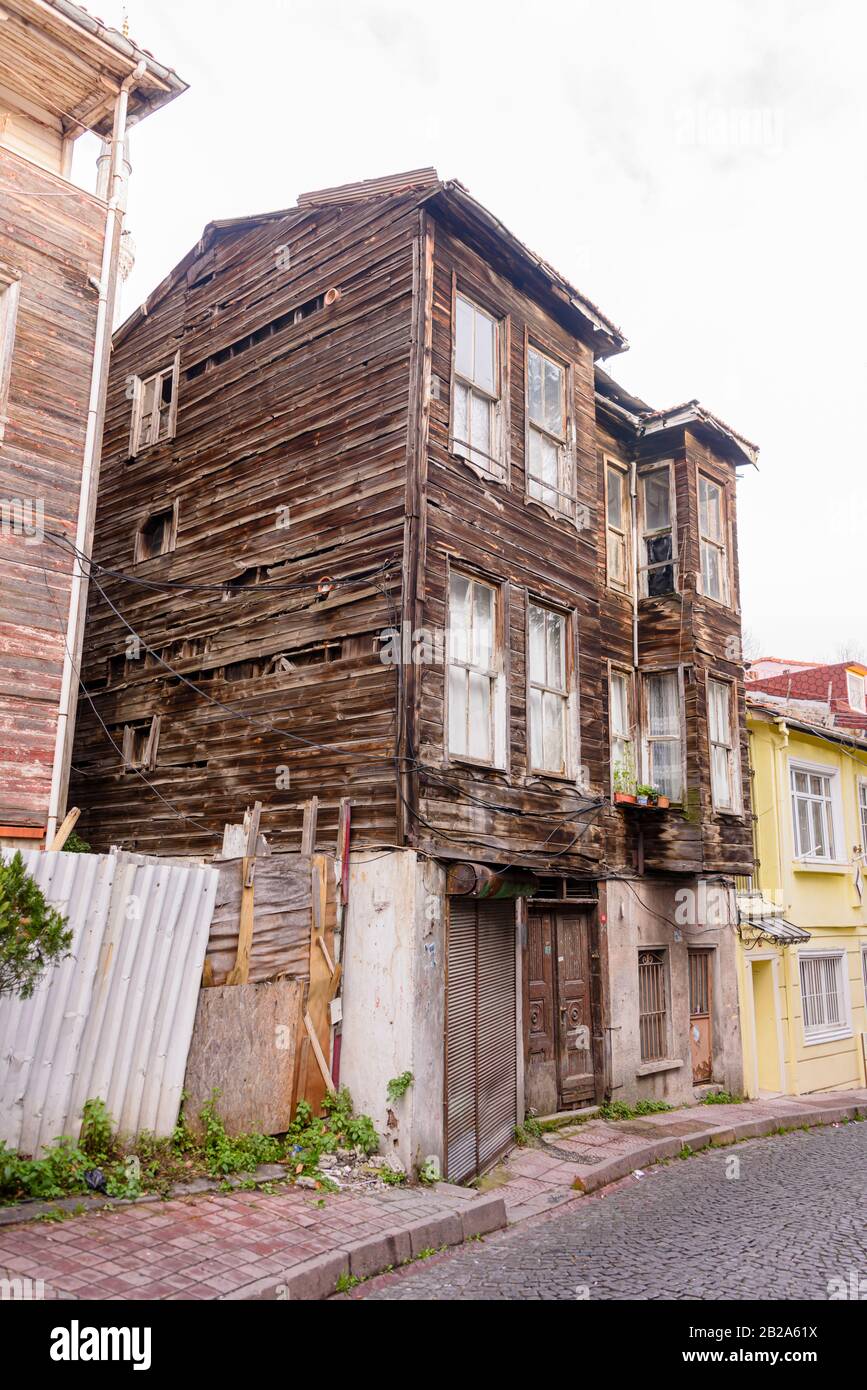 Old, delapidated timber-clad apartment building in Istanbul, Turkey Stock Photo