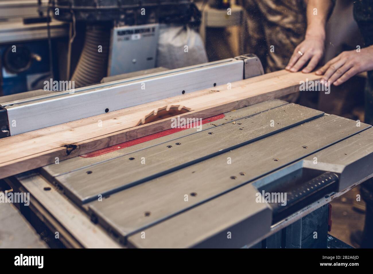 Carpentry technology work on the circular sawmill Stock