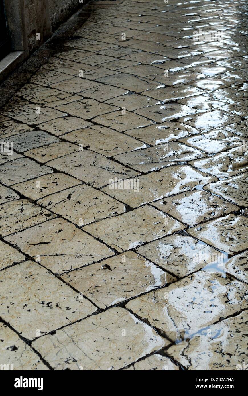 Paved street of Dubrovnik old town after light rain. Dubrovnik old town, Croatia Stock Photo