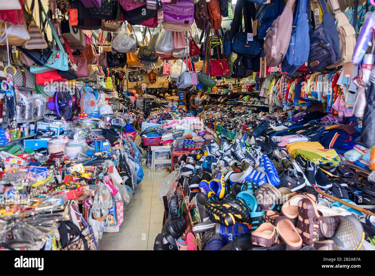 Very messy shoe and bag shop, Phuket, Thailand Stock Photo