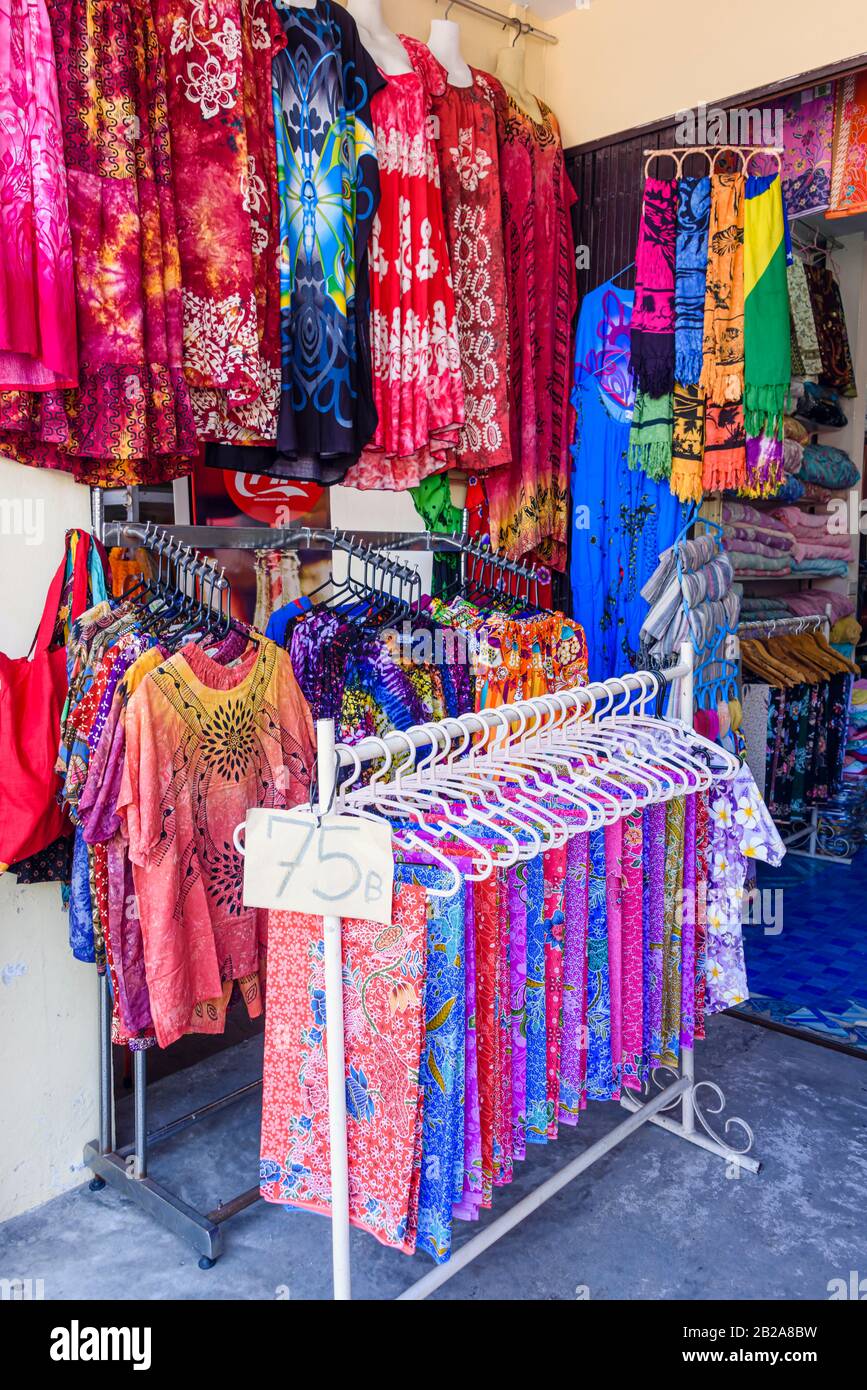 Silk 'hippie' 'hippy' tee shirts for sale a clothes shop, Phuket Old Thailand Stock - Alamy