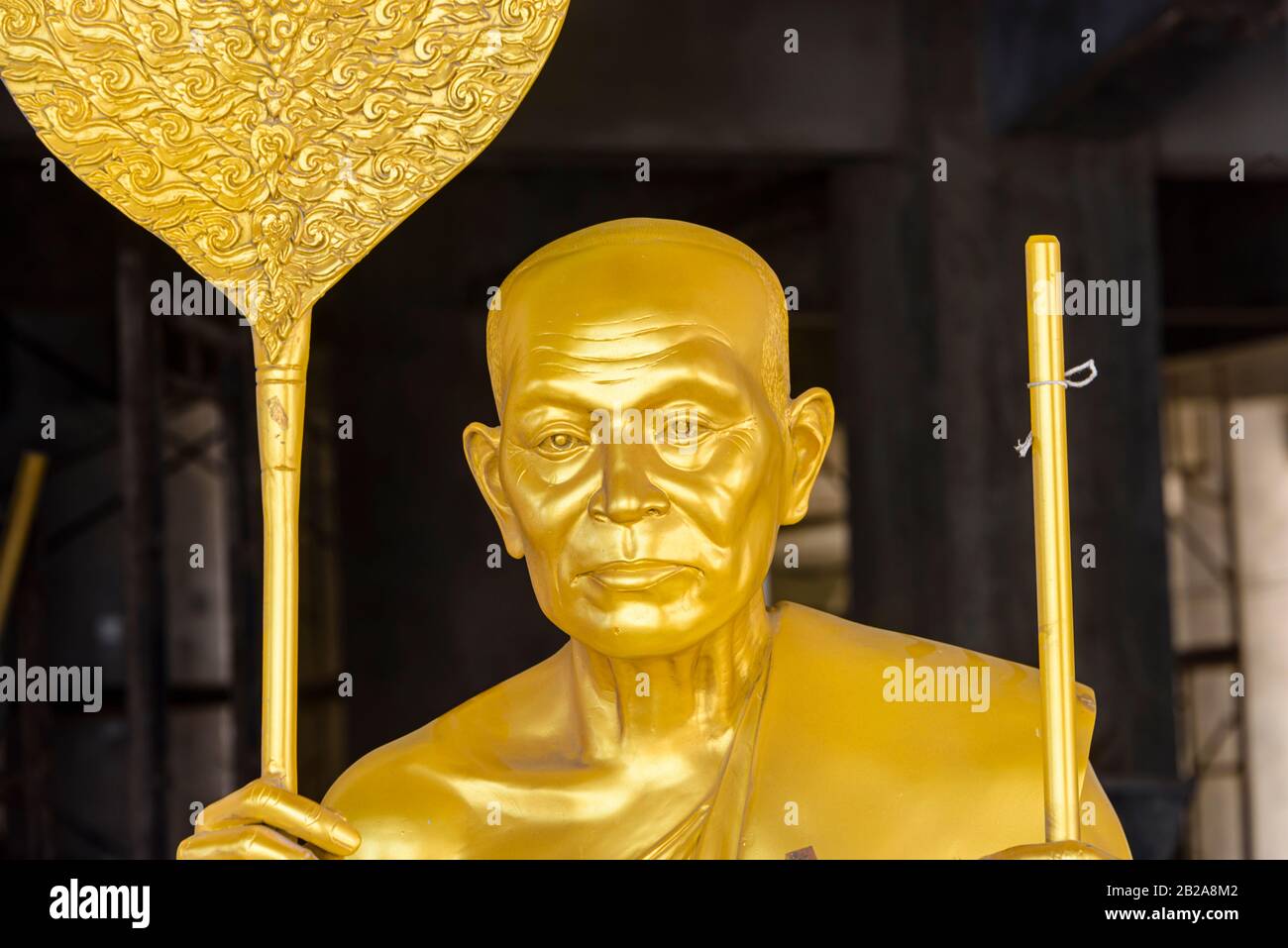 Golden statue of a Buddhist Monk, Thailand Stock Photo