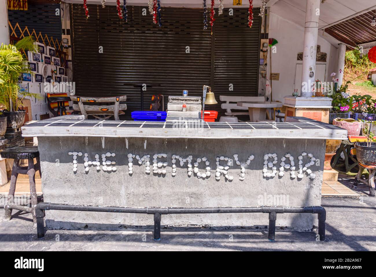'The Memory Bar' sign made out of white pebbles, Kata village, Phuket, Thailand Stock Photo