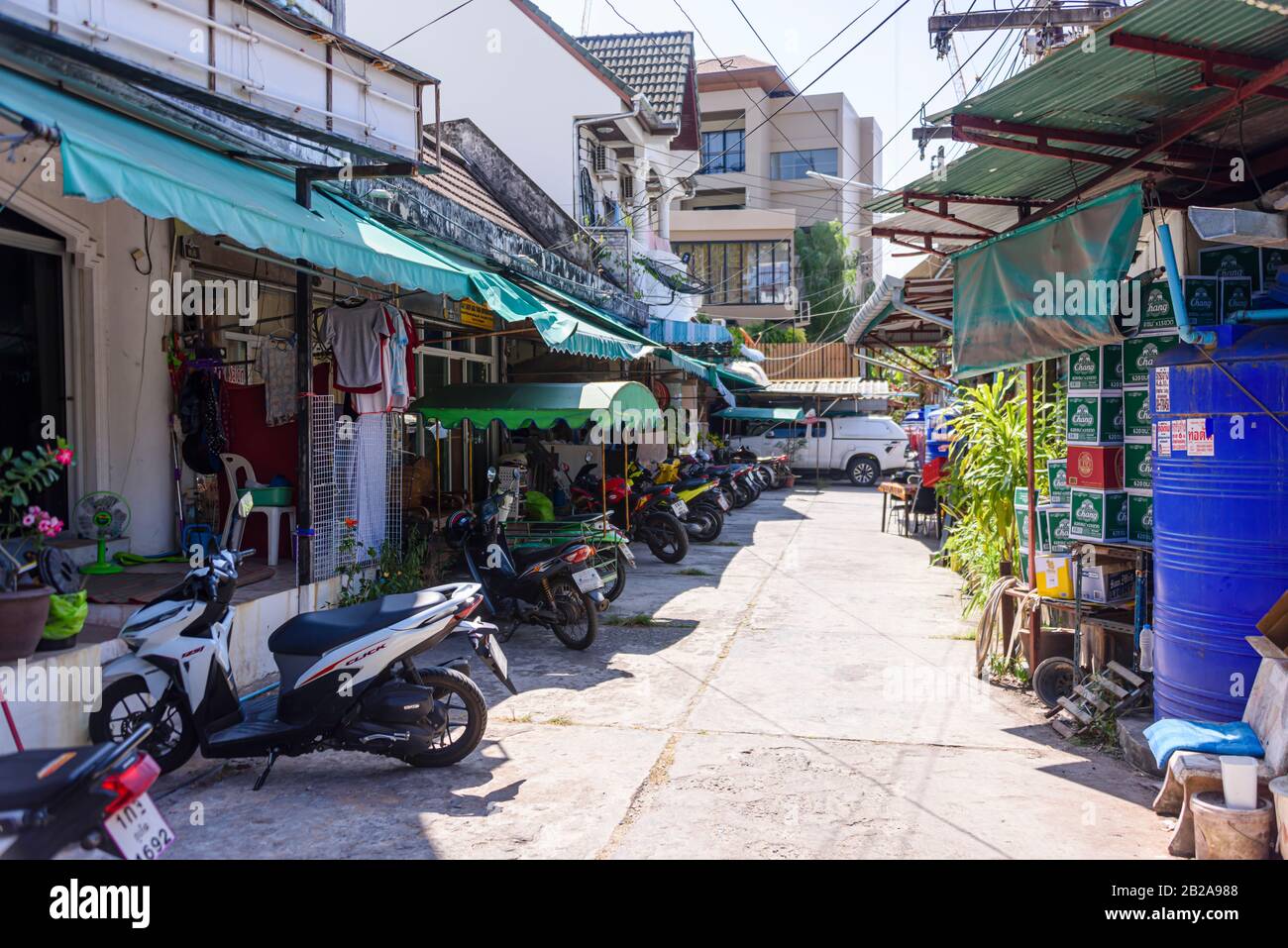 Motor scooters parked outside buildings hires stock photography and