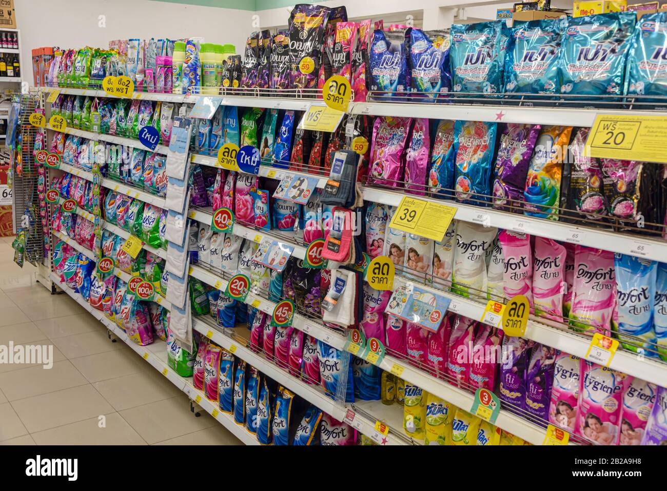 Shelves with washing powder and detergents in a Tesco Lotus Express, Thailand Stock Photo