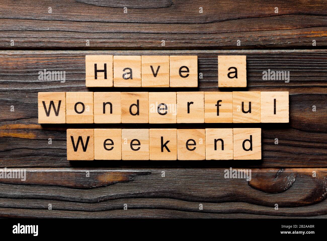 Have a wonderful weekend word written on wood block. Have a wonderful ...