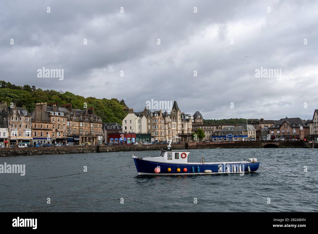 Fishing boat sailing into Oban harbour, Argyll & Bute, Scotland, UK Stock Photo