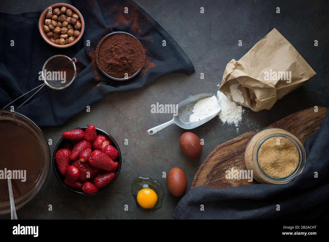 Ingredients to make a chocolate strawberry cake Stock Photo