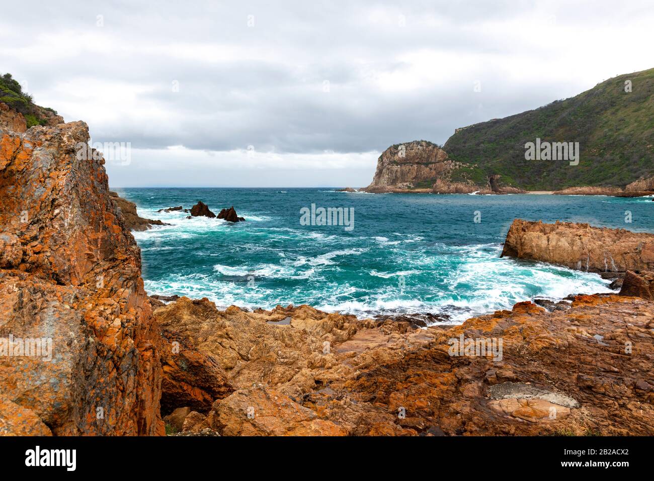 The Heads showing the rocky coastline by the town of Knysna on the Garden Route, Western Cape, South Africa Stock Photo
