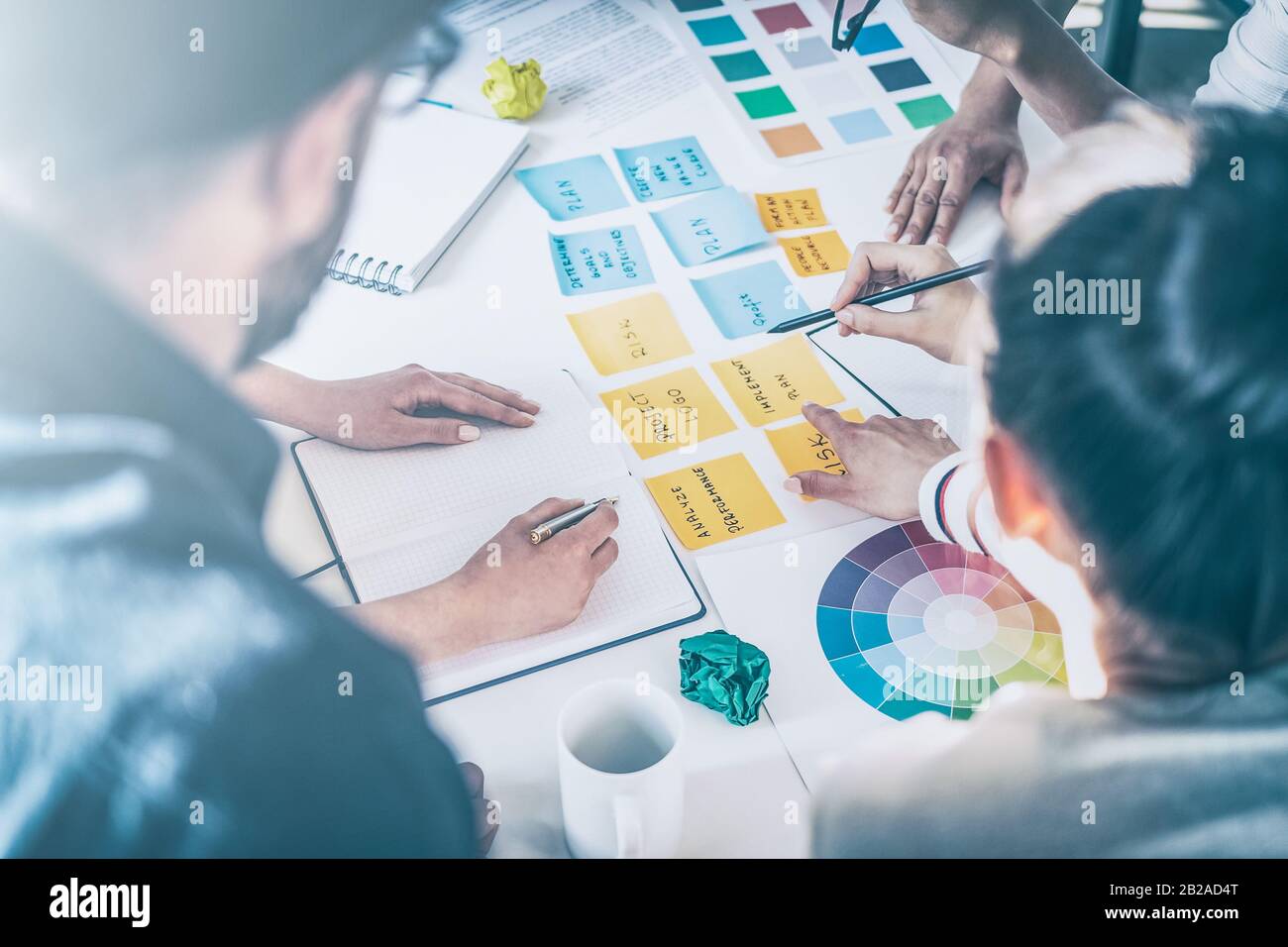 Business people meeting at office and use post notes to share idea. Brainstorming concept. Stock Photo