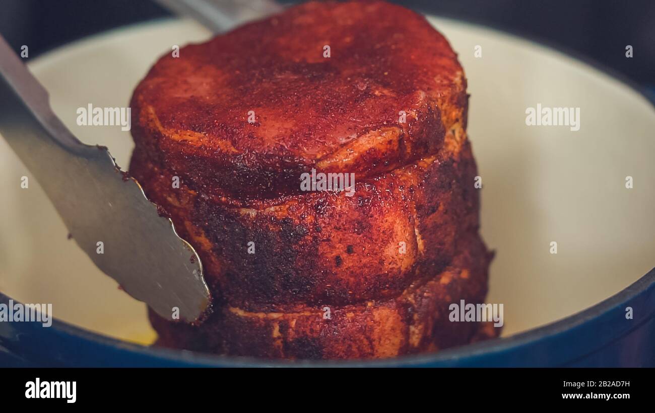 Step by step. Cooking boneless pork roast in cast iron dutch oven Stock