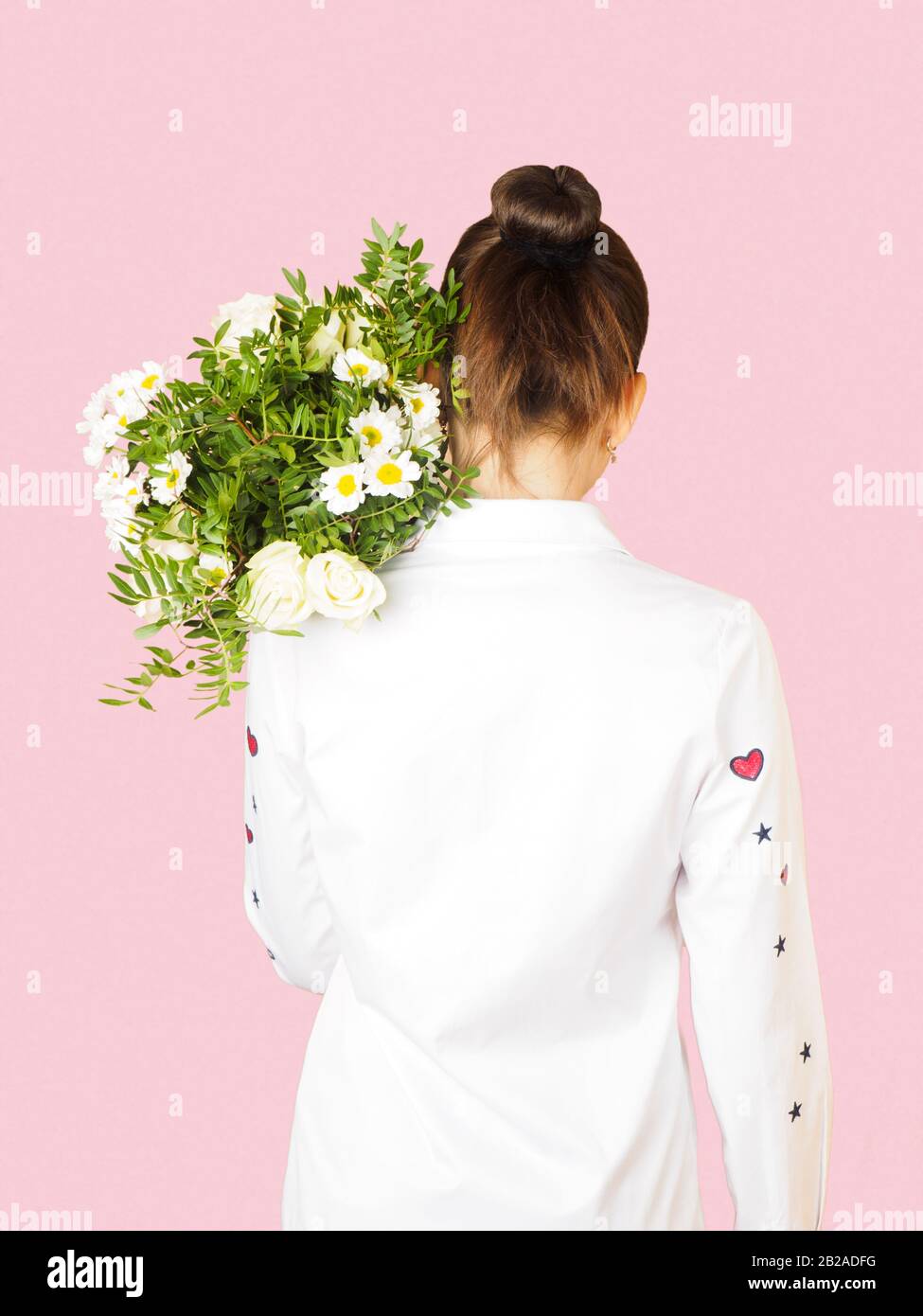 green shirt with pink flowers