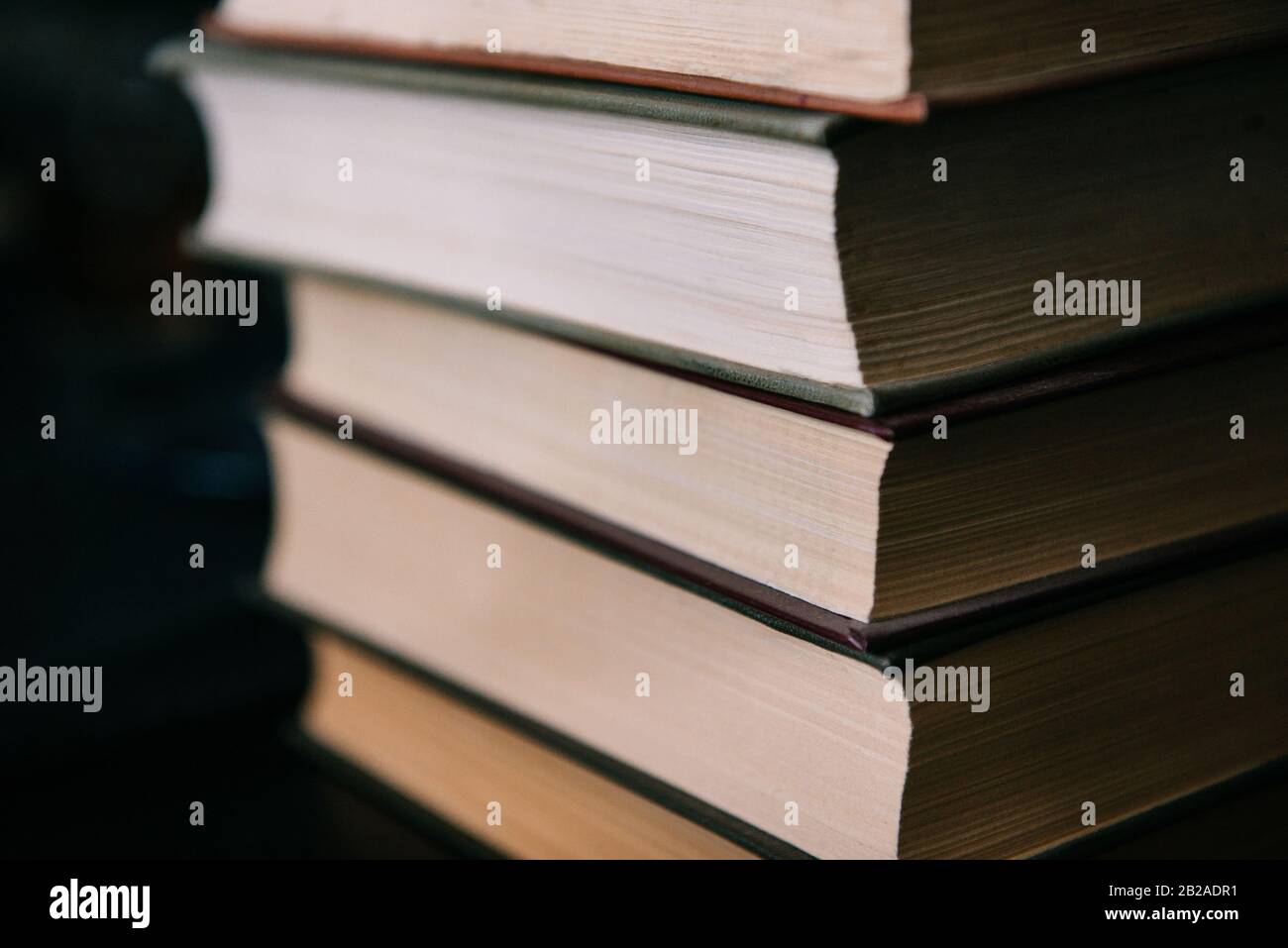 Close-up of a stack of hardback books Stock Photo