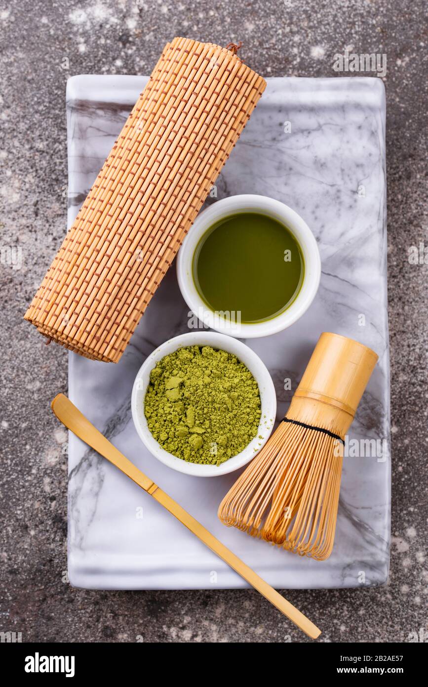 Matcha tea and bamboo whisk Stock Photo Alamy