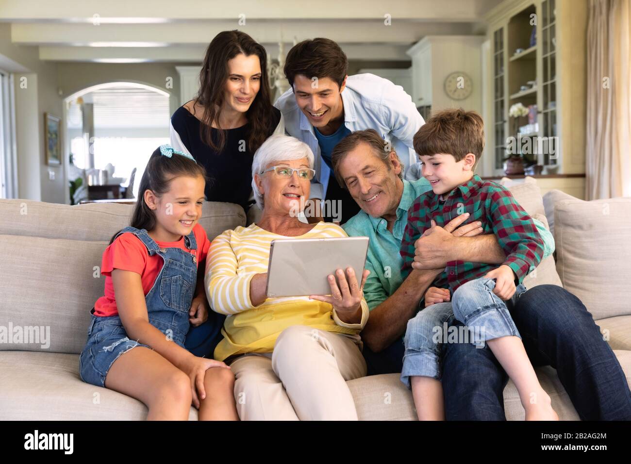 Front view of six members of a multi-generation Caucasian family at ...