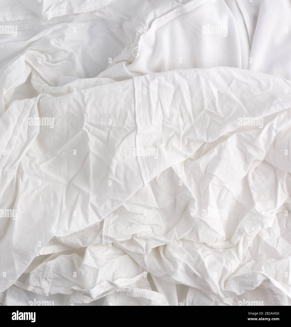 crumpled white cotton fabric, fabric for sewing clothes and shirts, full  frame Stock Photo - Alamy