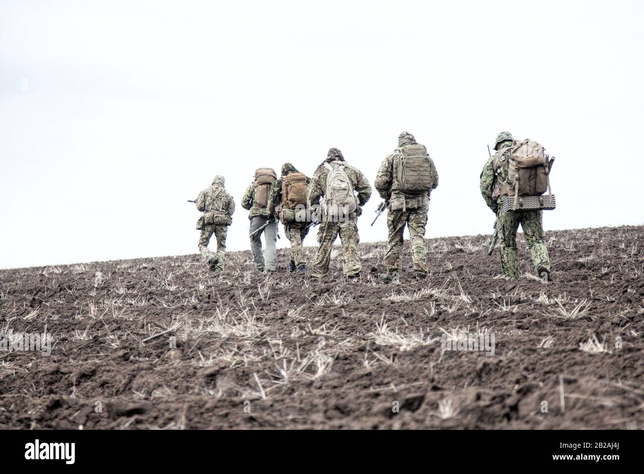 Army soldiers on march. Elite forces fighters group, commando tactical ...
