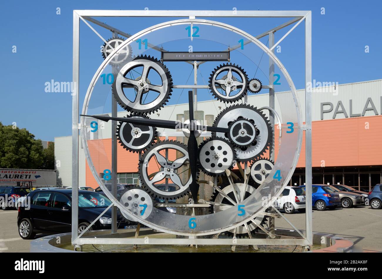 Mechanical Water Clock or Time Piece Contraption Using Flowing Water & Series of Cogs Stock Photo