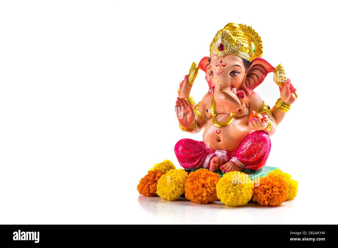 Hindu God Ganesha. Ganesha Idol on white Background Stock Photo ...