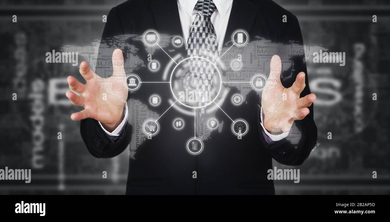 Businessman Pressing Button, Icons on Virtual Screen. Digital Marketing, Payment, Online Banking and Global Networking. Futuristic Business Concept. Stock Photo