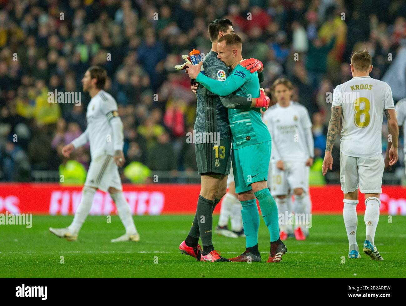Tibaut Courtois and Ter Stegen of Real Madrid celebrates after the Spanish La Liga match round 26 between Real Madrid and FC Barcelona at Santiago Bernabeu Stadium in Madrid.Final score: Real Madrid 2-0 Barcelona. Stock Photo