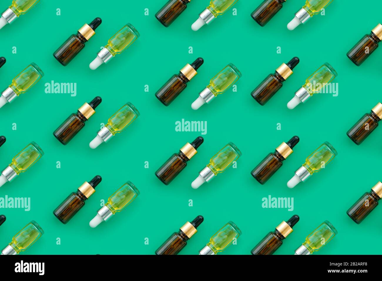 Glass bottles with essential oils assorted in geometry pattern Stock ...