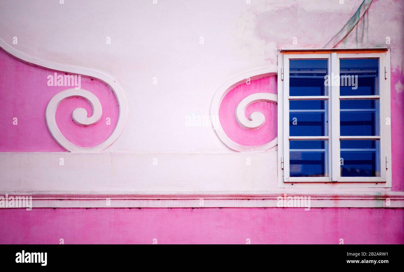 Old wooden window and a stylish plaster frame Stock Photo - Alamy