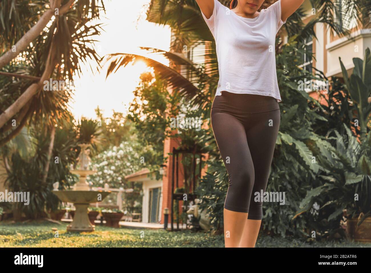 Step aerobics. Cropped image of woman exercise doing step aerobics ...
