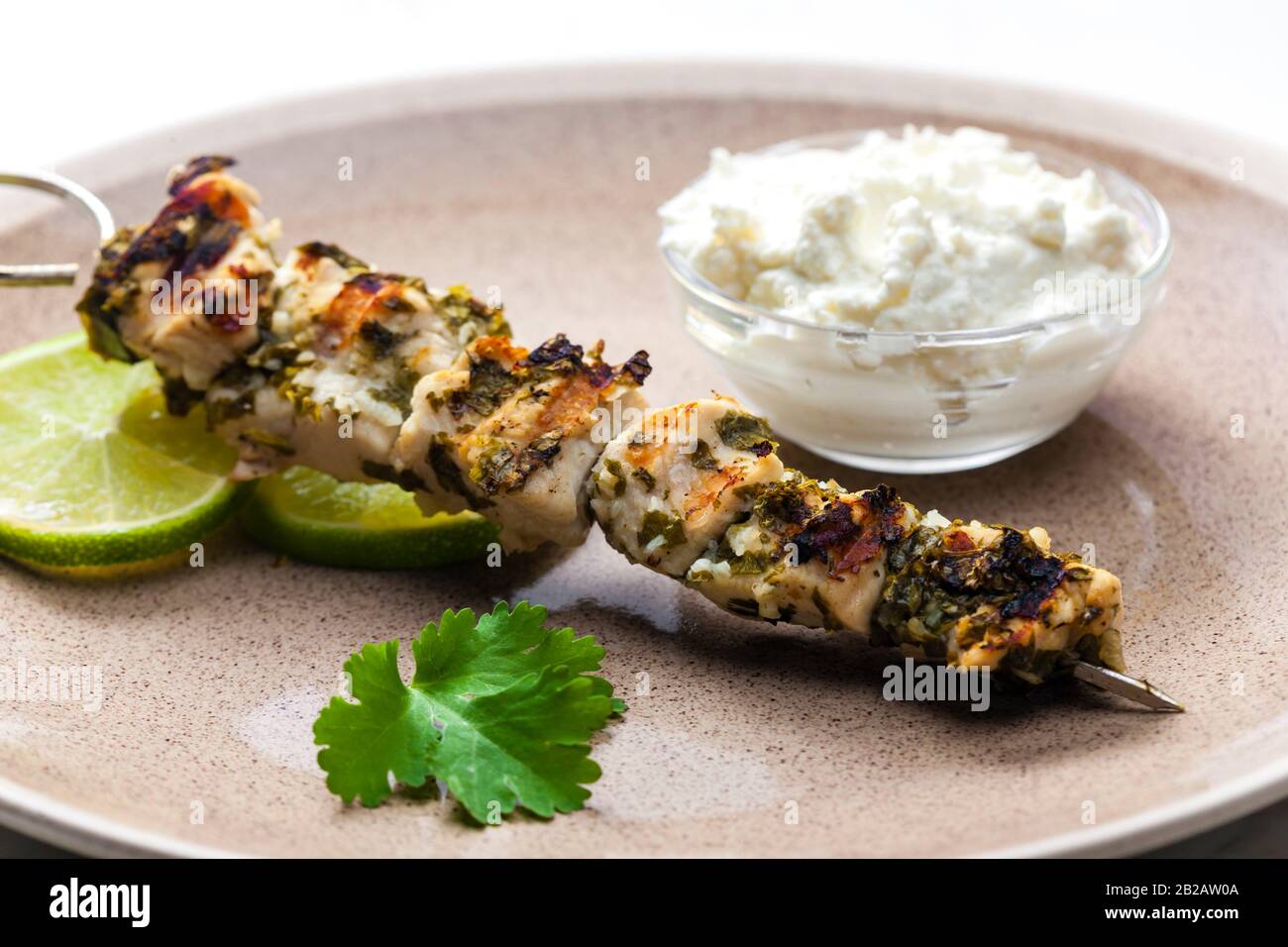 Greek skewers of chicken with oregano Stock Photo Alamy