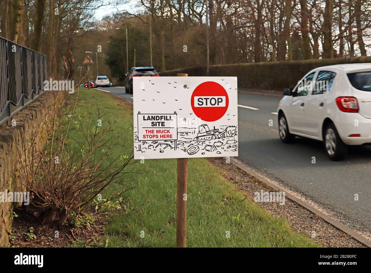 The muck stops here protest sign alongside the A5209, Hall Lane at Appley Bridge, Lancashire. Local concern about tipping at a former land fill site. Stock Photo