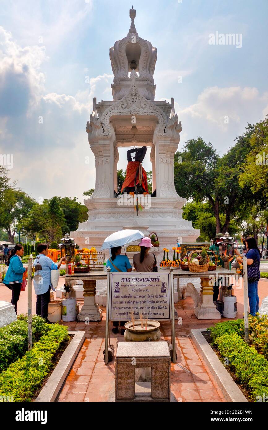 Shrine to Thokkathan (Mother Earth Squeezing Her Hair) Ratchadamnoen Road, Bangkok, Thailand Stock Photo