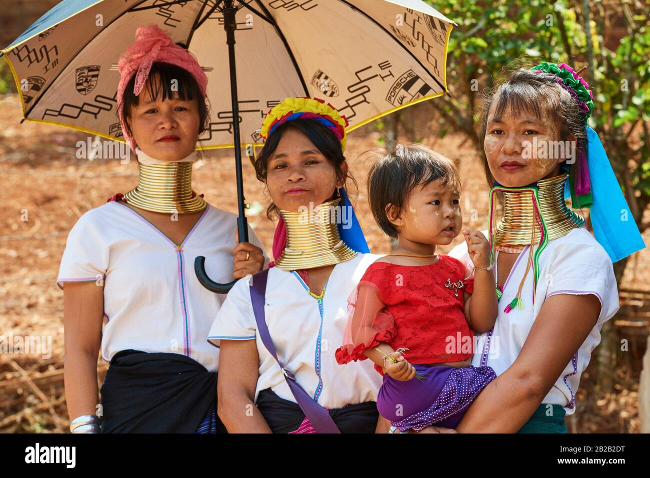 Kayan Lahwi women at the Kay Htein Bo village celebration. The Long Neck Kayan (also called Padaung in Burmese) are a sub-group of the Karen ethnic Stock Photo
