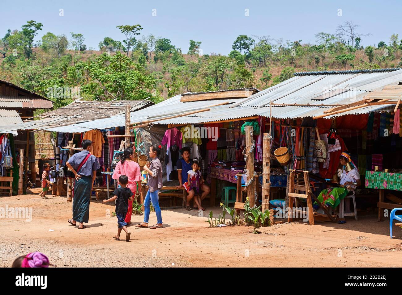 Tourist shops held by Kayan Lahwi women selling their hand woven fabric. The Long Neck Kayan (also called Padaung in Burmese) are a sub-group of the Stock Photo