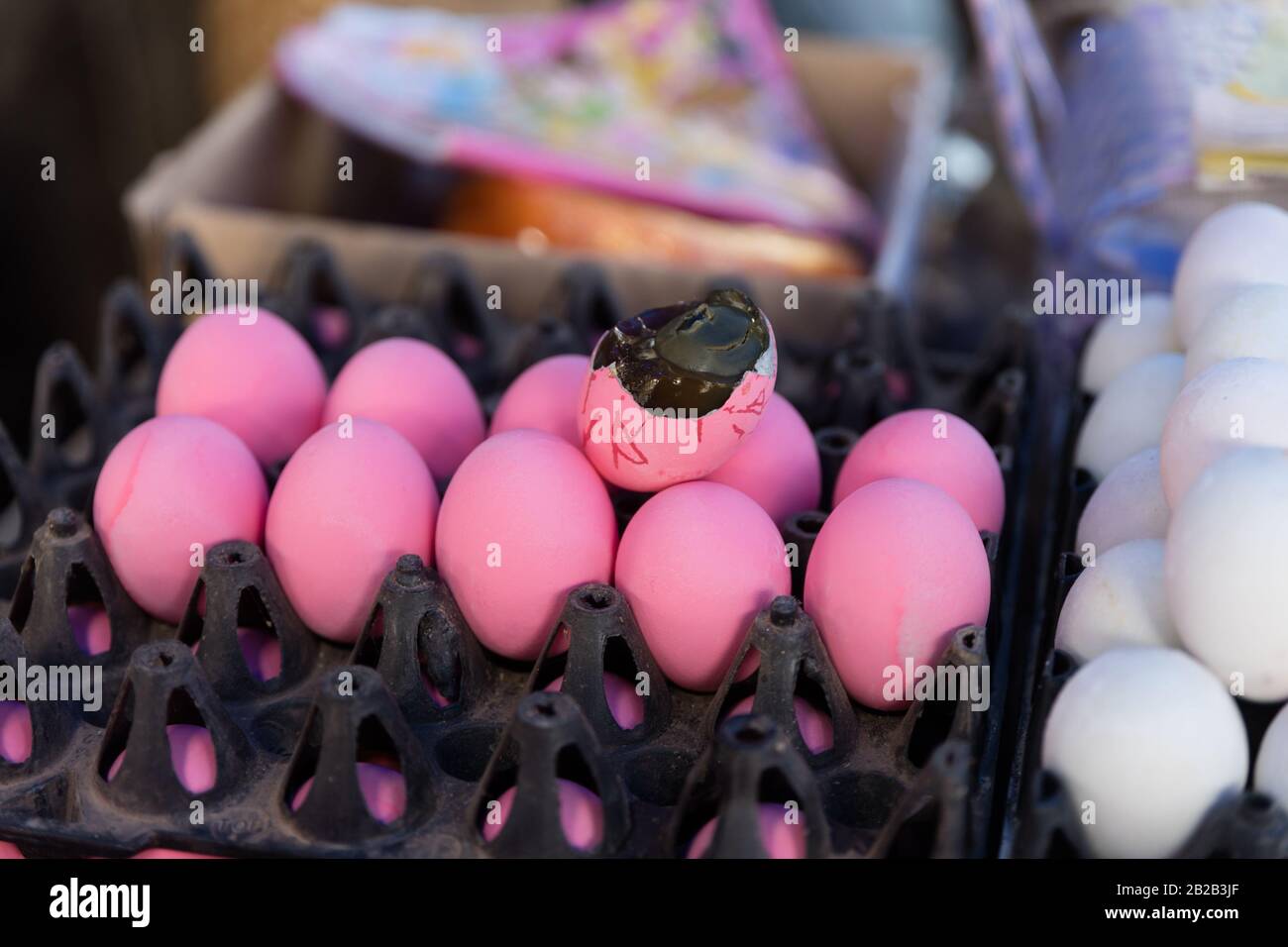 Pink eggs sold in market in Luang Prabang Stock Photo - Alamy