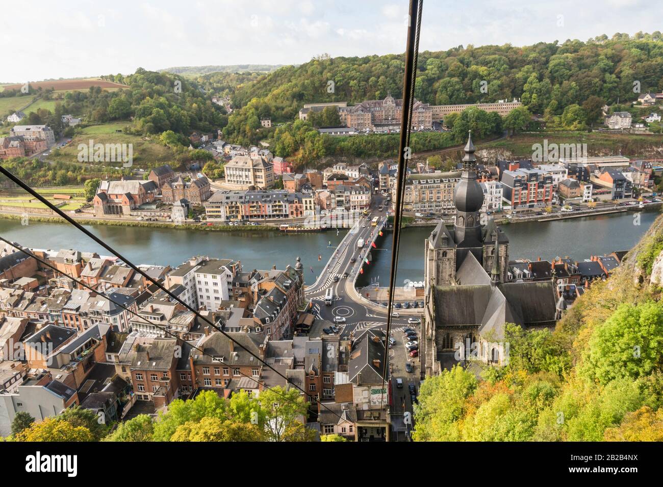 Charles de Gaulle bridge crossing the river Meuse in the picturesque town of Dinant Belguim. October 2019. Stock Photo