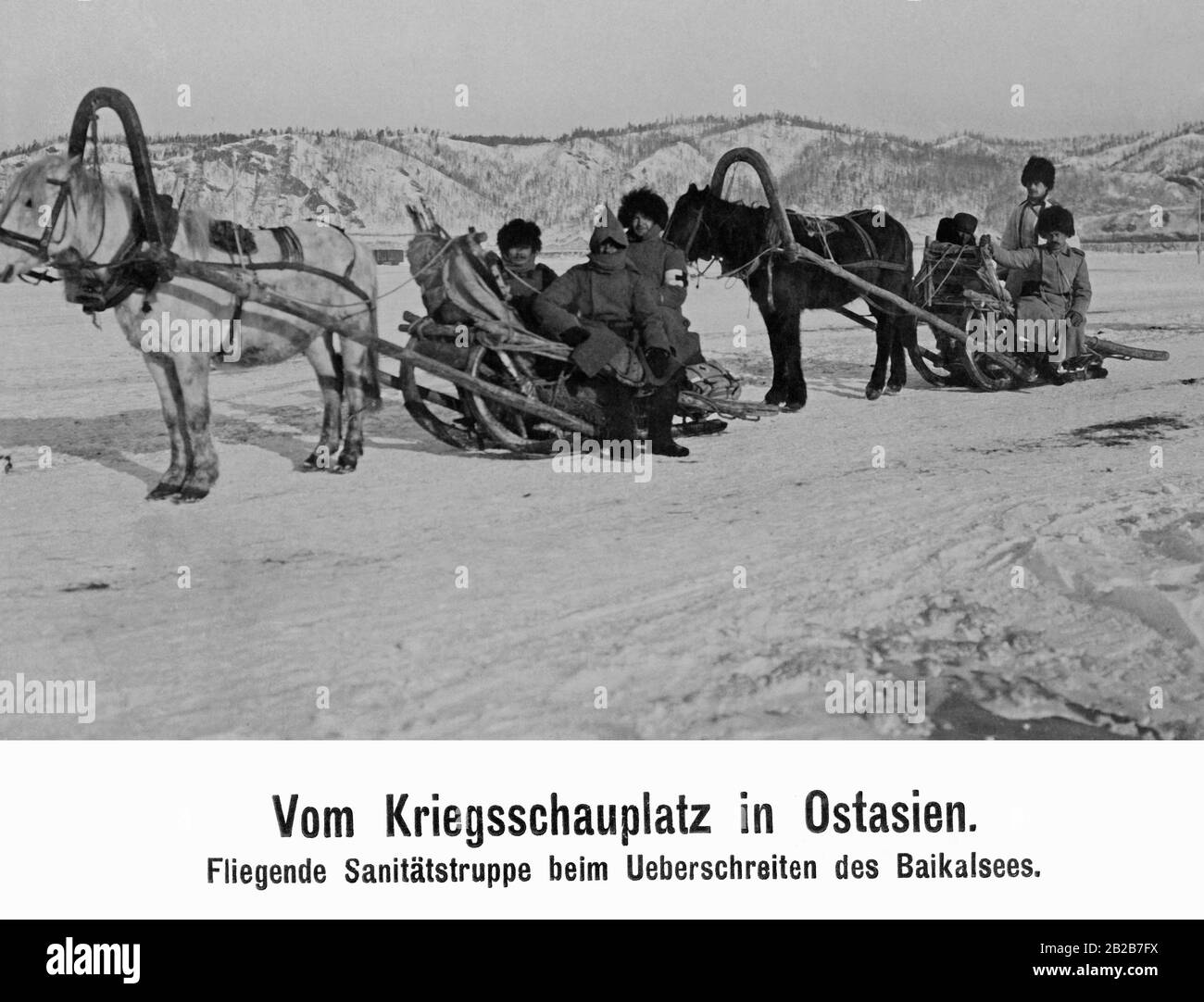 During the Russo-Japanese war: a Russian army medical corps crosses the frozen Lake Baikal on horse sleigh. Stock Photo
