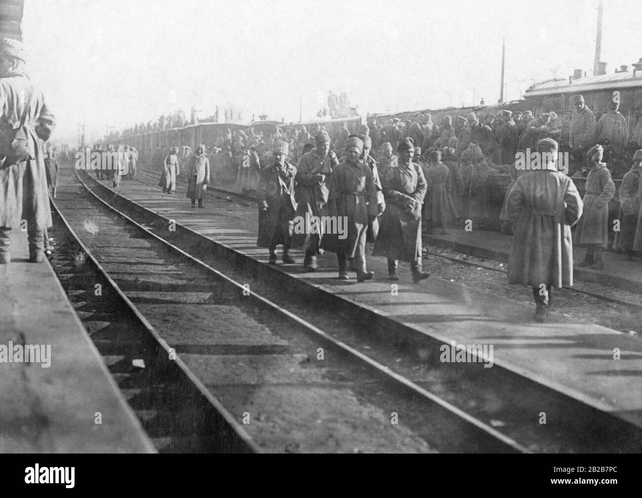 Russian soldiers try to get home at a train station at the Eastern front. Stock Photo