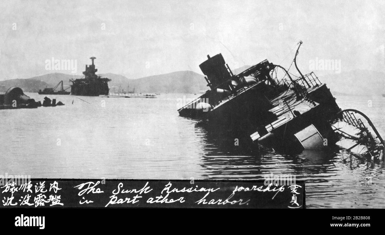 A sinking russian warship after the japanese attack on the fleet in Port Arthur, today's Lüshunkou. Stock Photo