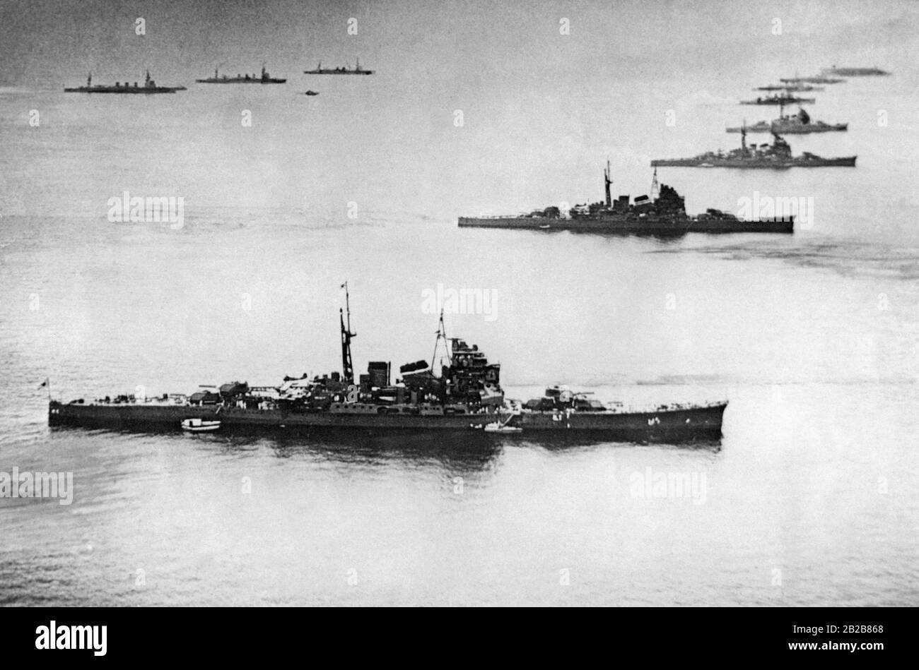 View over the sea near Tokyo. Some warships of the Imperial Japanese Navy enter the port of Tokyo after a naval maneuver off the coast. (Undated photo, ca. 1930s) Stock Photo