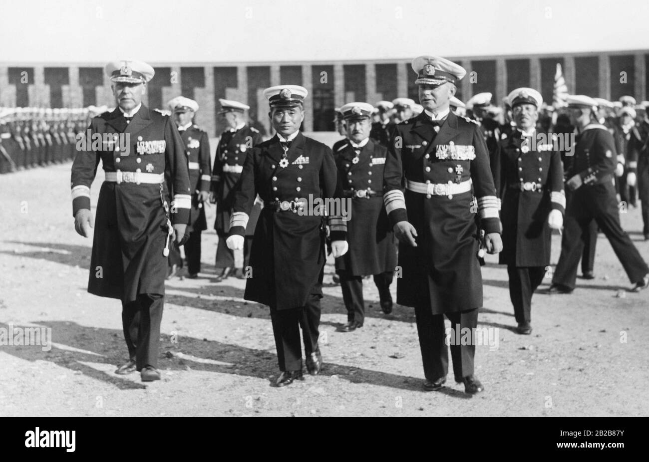 The naval staff of the Imperial Japanese Navy visiting Germany at the Naval Memorial in Laboe near Kiel. The Japanese officers are accompanied by members of the German naval staff. F.l. Rear Admiral Mewis, Rear Admiral Kobayashi and Admiral Albrecht. Stock Photo