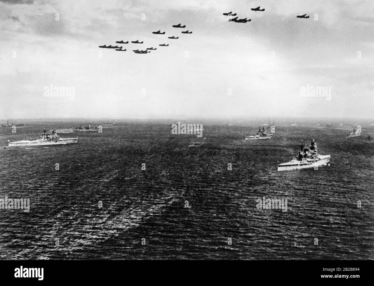 View over the sea off the Japanese coast during a fleet maneuver of the Imperial Japanese Navy. Stock Photo