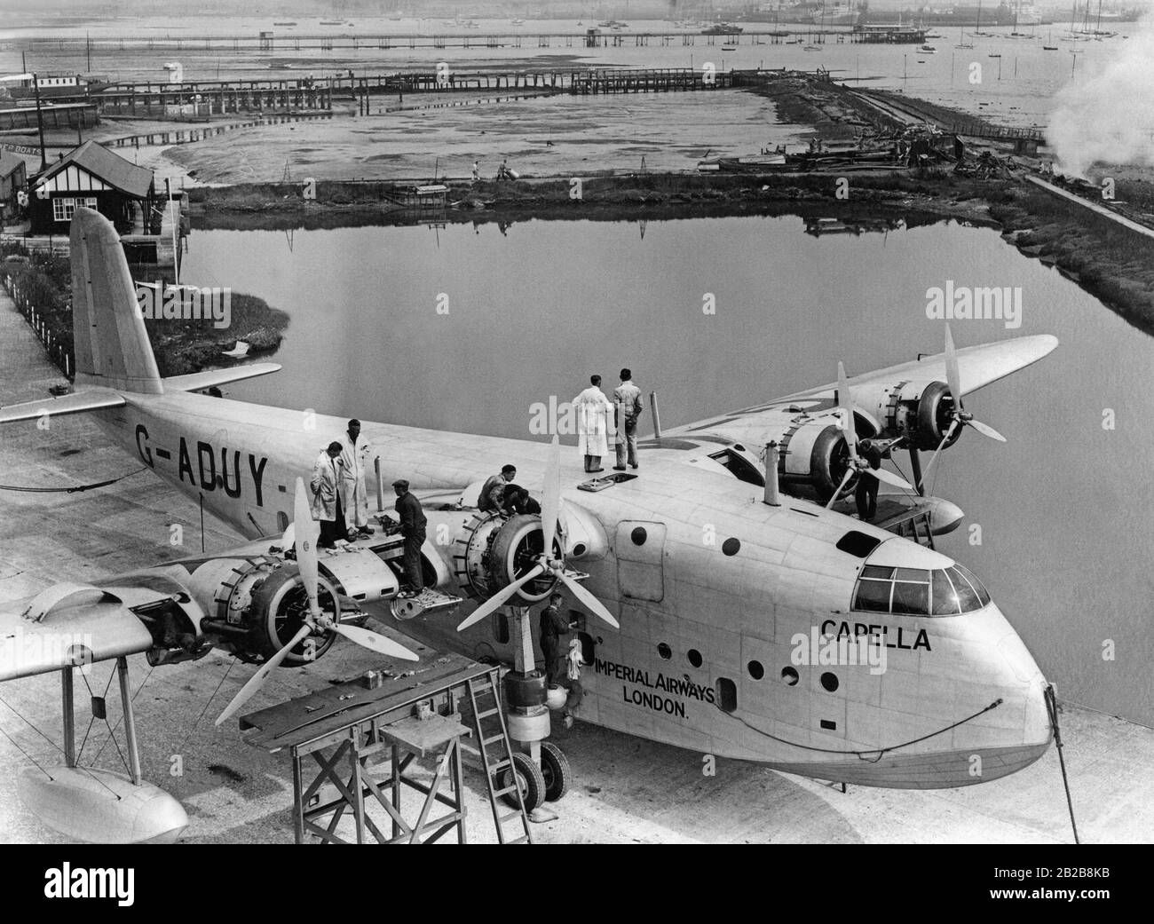 A flying boat of the type Short Empire ( named 'Capella') during maintenance work in the dock in Southampton. Stock Photo