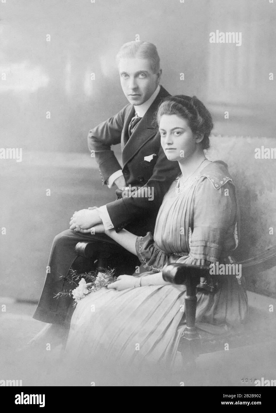 Prince Heinrich XXXIX Reuss zu Koestritz of the German aristocrat family Reuss married Antonia Emma Elisabeth, born Countess zu Castell-Castell, on August 7, 1918 in Castell in Lower Franconia. The prince was a member of the Prussian parliament and Prussian first lieutenant at the Viennese embassy. The picture shows their engagement photo. Stock Photo