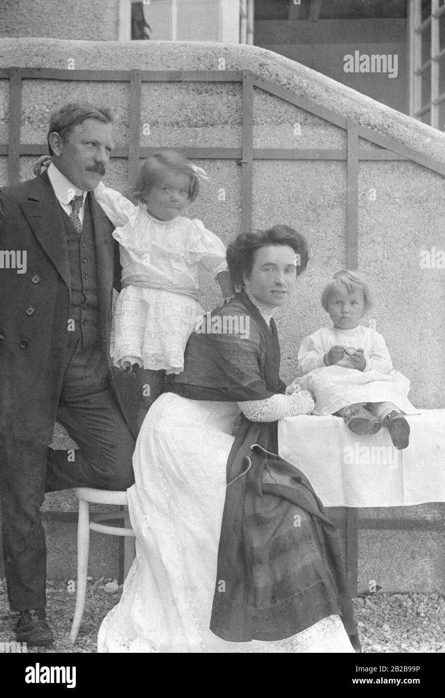 A middle-class family with two children. Undated photo. Stock Photo