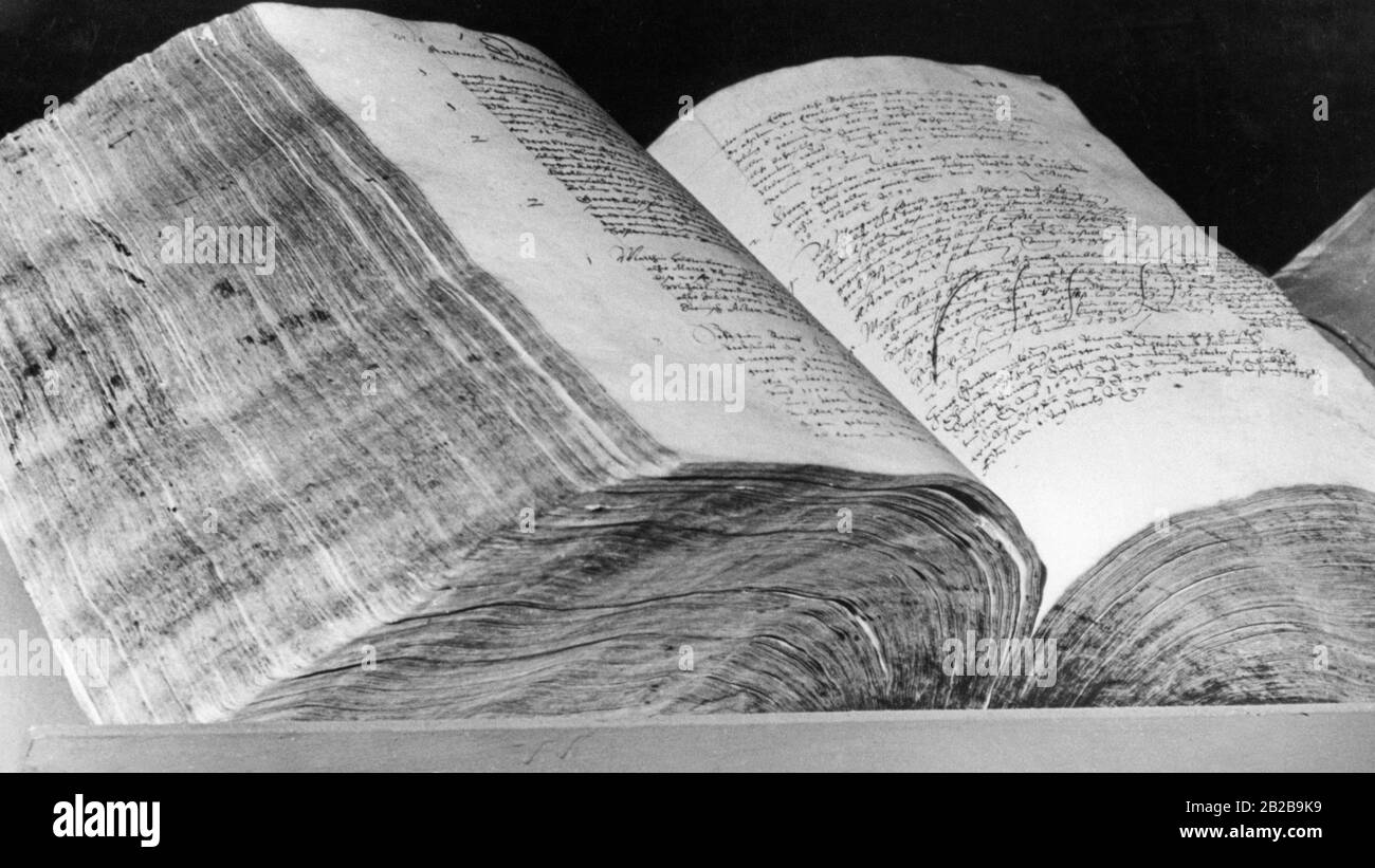 View of two opened pages of a land register Stock Photo Alamy